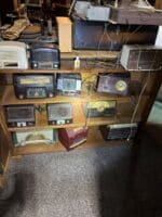 radios on wooden shelf