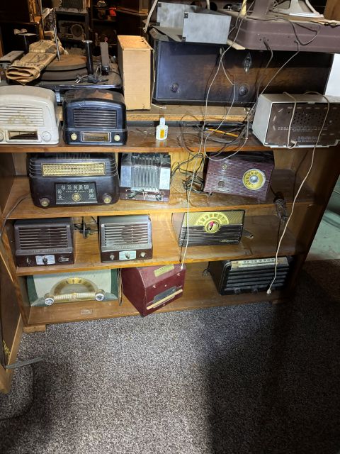 radios on wooden shelf